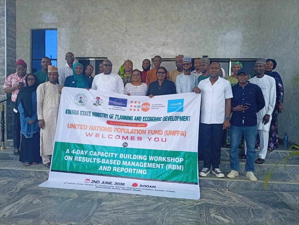 R-L: Youth Representative, Ms. Khadijat Yaqub; State Coordinator, UNFPA, Mallam Abubakar Zakariyahu; Representative of Executive Secretary KWSPHCDA, Dr (Mrs) Medinat Olaosebikan; Resource Person from UNFPA, Etimita Nnanke; State Focal Person, UNFPA, Mrs Gloria Enueze; Honourable Commissioner for Planning and Economic Development, Dr (Mrs) Mary Ronke Arinde; Resource Person, UNFPA, Mr Yusuf Bello; State Director of Planning, Alh. Ibrahim Barka; M & E Officer, KWSPHCDA, Mr Stephen Okedare; Representative of RHHF, Mr Ogundele Olusegun in a group photograph at the workshop today.