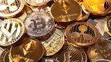 Bitcoin plummets 40% from peak, as Standard Chartered slashes forecasts