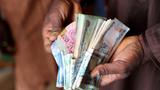 Naira ends week flat as reserves post 13-day losing streak