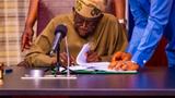 Pictures: President Tinubu signs tax reform bills into law