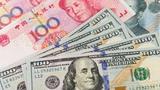 Yuan weakens to 7.1705 against dollar