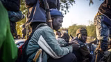 Community leader allegedly leads armed group in search of resident’s home
