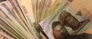 Naira edges slightly amid volatility in FX market