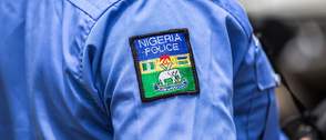 Police arrest man with human head