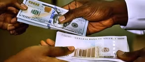 Naira closes at N1375 against dollar