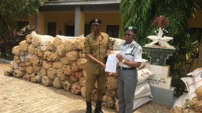 Customs hand over intercepted 1,400kg suspected cannabis sativa to NDLEA