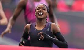 Kipyegon fails to become first woman to run sub-four-minute mile