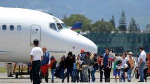 Deportation flight lands in Colombia after migration dispute with U.S