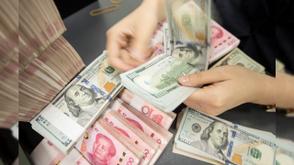 China's Yuan strengthens 7.1695 against US dollar