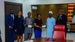 Okpebholo presents N200m cheque to families of bereaved civil servants