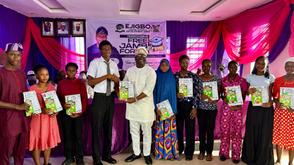 Ejigbo LCDA Chairman supports Students with JAMB forms, English textbooks