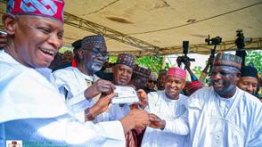Shekarau receives APC membership card in Kano