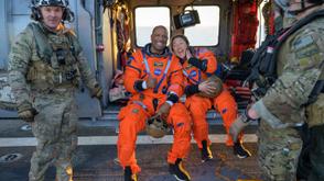 Astronauts return safely after Moon orbit mission
