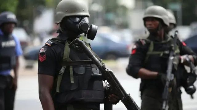 Police parade suspect with Beretta pistol