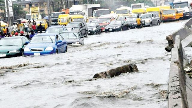 Floodwaters wreak havoc on Lagos community bridge, divides area in two