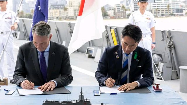 Australia, Japan seal $10bn warship deal