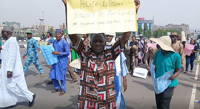 Retired Police Officers protest, block Presidential villa gate