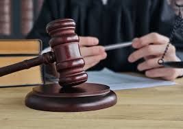 Woman, 33, docked over alleged assault, conspiracy