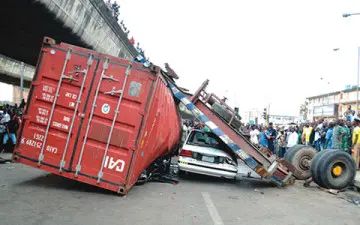 POS operator crippled as 40ft truck crushes mini-bus in Lagos