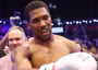 Joshua dedicates comeback victory to late coaches, eyes Fury showdown