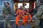 Astronauts return safely after Moon orbit mission
